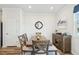 A dining room with a wooden table and chairs, and a stylish wall mirror at 5217 Invention Way, Raleigh, NC 27616