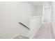 Hallway with stairway and white walls at 5217 Invention Way, Raleigh, NC 27616