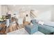 Spacious open-concept living space with hardwood floors and a clear view into the dining area and kitchen at 5217 Invention Way, Raleigh, NC 27616