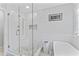 Bright bathroom features a glass shower, and modern design at 5424 Westminster Ln, Fuquay Varina, NC 27526