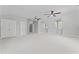 Large bonus room with carpet, ceiling fans, and windows at 5424 Westminster Ln, Fuquay Varina, NC 27526