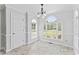 Bright breakfast nook with large windows overlooking the backyard at 5424 Westminster Ln, Fuquay Varina, NC 27526