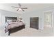 Large main bedroom features a ceiling fan and an ensuite bathroom at 5424 Westminster Ln, Fuquay Varina, NC 27526