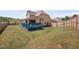 Beautiful home with a large backyard, deck, and lawn, perfect for relaxing and entertaining at 556 Rolling Meadows Dr, Clayton, NC 27527