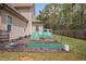Well-maintained backyard featuring raised garden beds, perfect for outdoor enjoyment and gardening enthusiasts at 556 Rolling Meadows Dr, Clayton, NC 27527