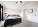 Relaxing bedroom with vaulted ceiling, carpeted floors, and access to an en suite bathroom at 556 Rolling Meadows Dr, Clayton, NC 27527