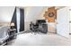 Versatile bonus room featuring dual monitors, desk, and a dartboard for entertainment at 556 Rolling Meadows Dr, Clayton, NC 27527