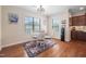 Bright breakfast nook with backyard views and matching decor at 556 Rolling Meadows Dr, Clayton, NC 27527
