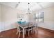 Dining room with coffered ceiling and elegant furnishings at 556 Rolling Meadows Dr, Clayton, NC 27527