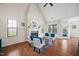 Bright living room with a fireplace and large windows at 556 Rolling Meadows Dr, Clayton, NC 27527
