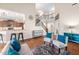 Open-concept living room with hardwood floors and modern decor at 556 Rolling Meadows Dr, Clayton, NC 27527