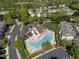 Picturesque aerial view of the community, showcasing the pool, landscaping, and surrounding homes at 5702 Cameo Glass Way, Raleigh, NC 27612