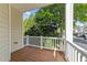 Private balcony offering a serene outdoor retreat with scenic views of the surrounding greenery at 5702 Cameo Glass Way, Raleigh, NC 27612