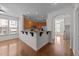 Open kitchen featuring stainless steel appliances, granite countertops, and a breakfast bar at 5702 Cameo Glass Way, Raleigh, NC 27612