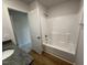 Bathroom featuring shower/tub combination at 58 Heatherglenn Cir, Princeton, NC 27569