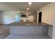 Beautiful kitchen with gray cabinets, granite countertops, and stainless steel appliances at 58 Heatherglenn Cir, Princeton, NC 27569