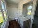 Bathroom featuring a tub and shower combination and a vanity with granite countertops at 61 Heatherglenn Cir, Princeton, NC 27569
