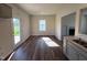 Bright dining area with hardwood floors and natural light, conveniently located off the kitchen at 61 Heatherglenn Cir, Princeton, NC 27569