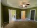 Spacious bedroom with a ceiling fan and ensuite bathrooms and large closet at 66 Saddle Ln, Lillington, NC 27546