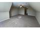 Spacious carpeted bedroom with ceiling fan and neutral walls provides a calming retreat at 66 Saddle Ln, Lillington, NC 27546