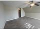 Large carpeted bedroom with ceiling fan and neutral walls offers a relaxing retreat at 66 Saddle Ln, Lillington, NC 27546