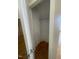 Small, walk-in closet featuring hardwood floors and a shelf at 66 Saddle Ln, Lillington, NC 27546