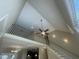 Interior view of the staircase and upper level, featuring vaulted ceilings and fan at 66 Saddle Ln, Lillington, NC 27546