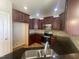 Kitchen featuring stainless steel appliances, modern cabinetry and granite counter tops at 66 Saddle Ln, Lillington, NC 27546