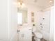 Clean bathroom featuring a shower-tub combo and vanity with sink at 67 Fern Ridge Dr, Cameron, NC 28326