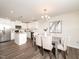 Bright dining area featuring modern lighting and stylish furniture at 67 Fern Ridge Dr, Cameron, NC 28326
