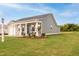 Well-maintained home with green lawn and tidy landscaping. Additional lot visible at 67 Fern Ridge Dr, Cameron, NC 28326