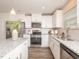 Bright kitchen with stainless steel appliances and granite countertops at 67 Fern Ridge Dr, Cameron, NC 28326