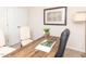 Office with a hardwood desk, neutral walls, carpet, and decorative elements at 67 Fern Ridge Dr, Cameron, NC 28326