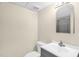Bathroom featuring a vanity with a light gray cabinet and brushed silver faucet at 6702 Huntsboro Rd, Oxford, NC 27565