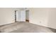 Bedroom with carpet and multiple doors and views of other rooms at 6702 Huntsboro Rd, Oxford, NC 27565