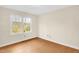 Bedroom featuring hardwood floors, one window, and neutral walls at 6702 Huntsboro Rd, Oxford, NC 27565