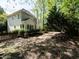 The house has a fenced backyard with a beautiful garden and a deck for relaxation and entertainment at 6909 Clear Sailing Ln, Raleigh, NC 27615
