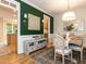 View of the dining room featuring hardwood floors, elegant decor, and an open layout at 6909 Clear Sailing Ln, Raleigh, NC 27615