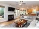 Spacious living area with open layout and hardwood floors, seamlessly connected to the kitchen at 6909 Clear Sailing Ln, Raleigh, NC 27615
