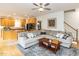 Spacious living area with open layout and hardwood floors, seamlessly connected to the kitchen at 6909 Clear Sailing Ln, Raleigh, NC 27615