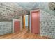 Cozy attic space with hardwood floors and unique painted walls and ceilings at 7110 Hunter Hill Rd, Rocky Mount, NC 27804
