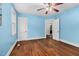 Spacious bedroom with hardwood floors, ample windows, and bright light at 7110 Hunter Hill Rd, Rocky Mount, NC 27804