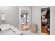 Well-lit bathroom showcasing a vanity and open doorway to closet at 7409 Fiesta Way, Raleigh, NC 27615