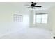 Bright and airy bedroom with neutral carpeting and large window at 743 Silver Stream Ln, Cary, NC 27519