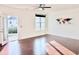 Bright and airy living room with hardwood floors and access to a private backyard at 743 Silver Stream Ln, Cary, NC 27519