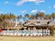 The community has a beautiful pool with a fenced in area and treelined backdrop at 743 Silver Stream Ln, Cary, NC 27519