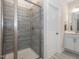 Modern bathroom with tiled shower stall and glass door with stylish fixtures and finishes at 781 Cormiche Ln, Wake Forest, NC 27587