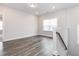 Bonus room boasts plenty of space, natural light and wood flooring at 781 Cormiche Ln, Wake Forest, NC 27587
