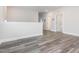Upstairs bonus room features gray wood flooring and natural light at 781 Cormiche Ln, Wake Forest, NC 27587