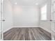 Bright office space with wood floors, large windows, and sleek white trim at 781 Cormiche Ln, Wake Forest, NC 27587